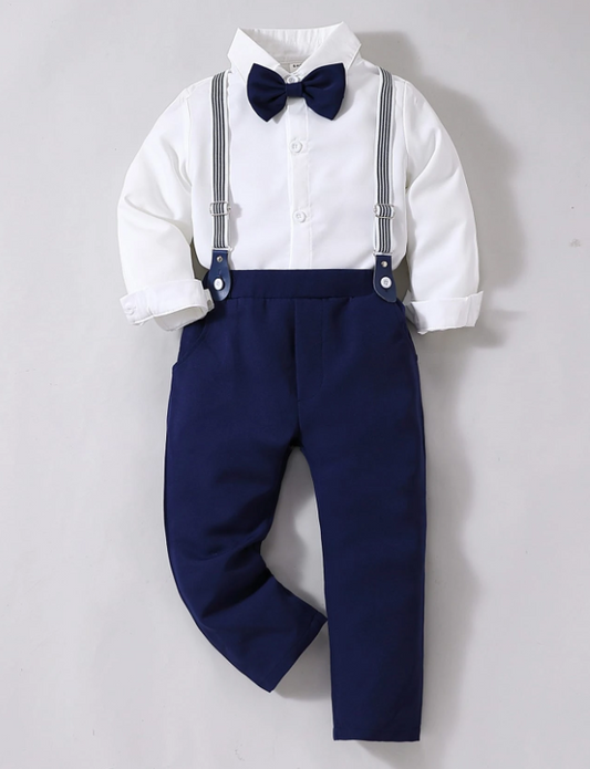 Conjunto formal para niño pequeño que incluye camisa con lazo delantero y pantalones con tirantes.