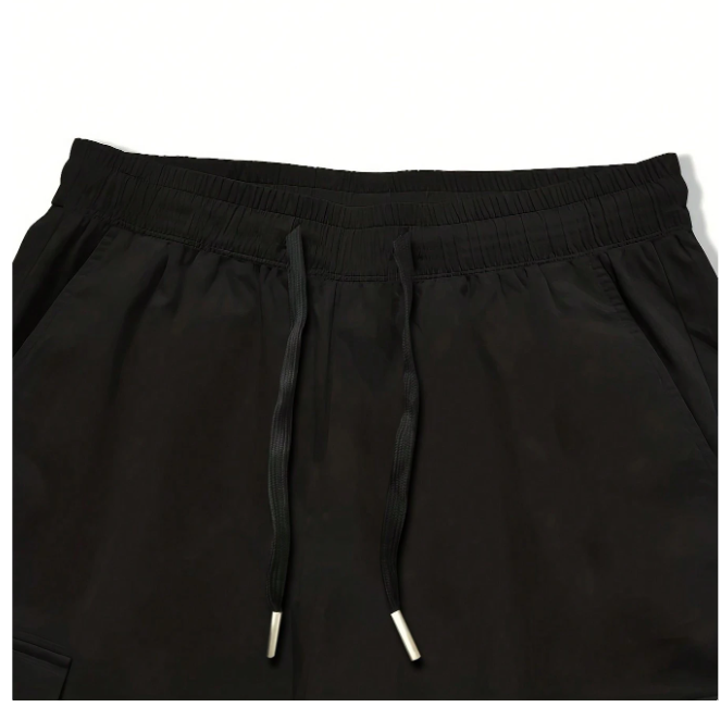 Pantalones cargo con bolsillo con solapa, cordón en la cintura y gráfico de letras