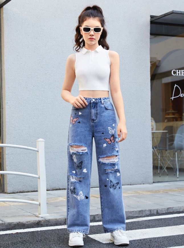 SHEIN Chicas adolescentes Jeans de pierna recta con estampado de mariposa desgarro